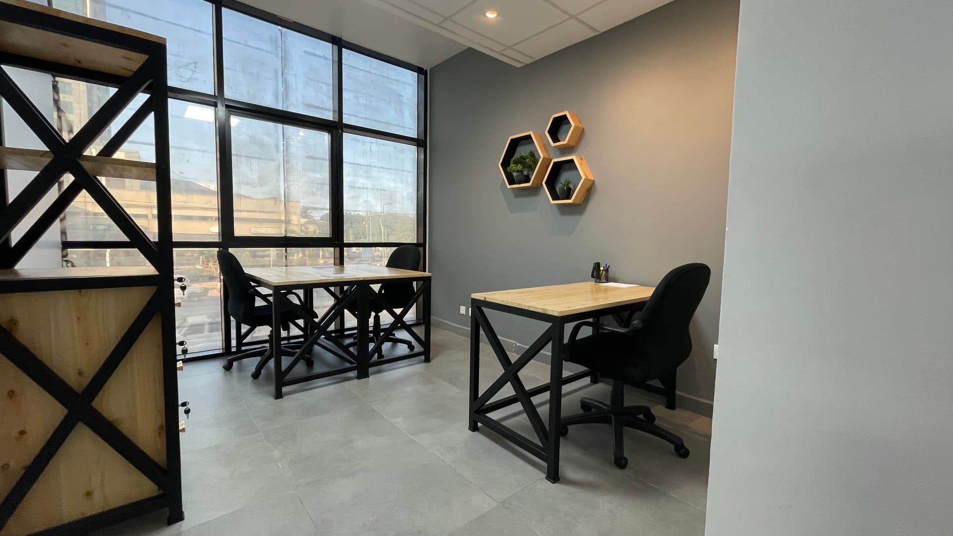 A three-person office at The Hive