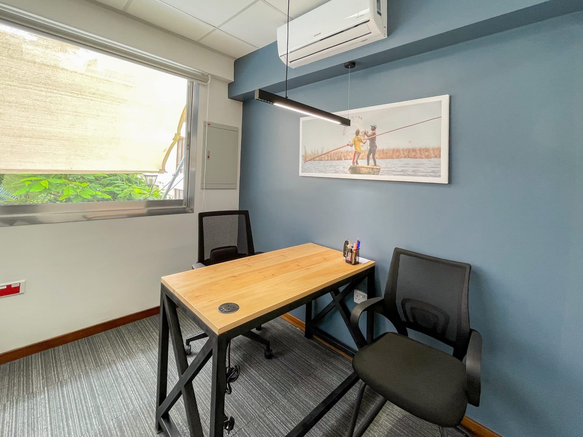A private office at ZO Slipway with a view of the trees